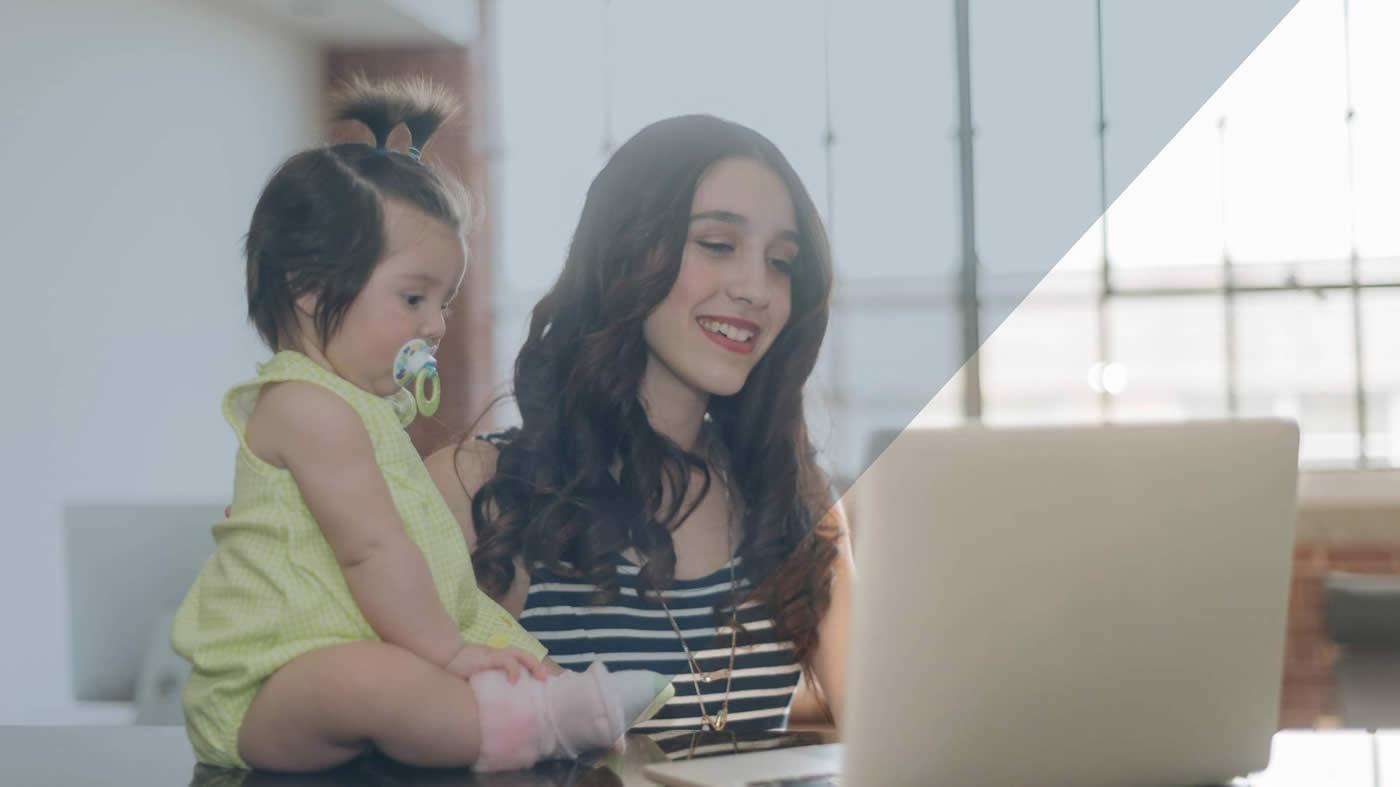 Women and child at computer screen