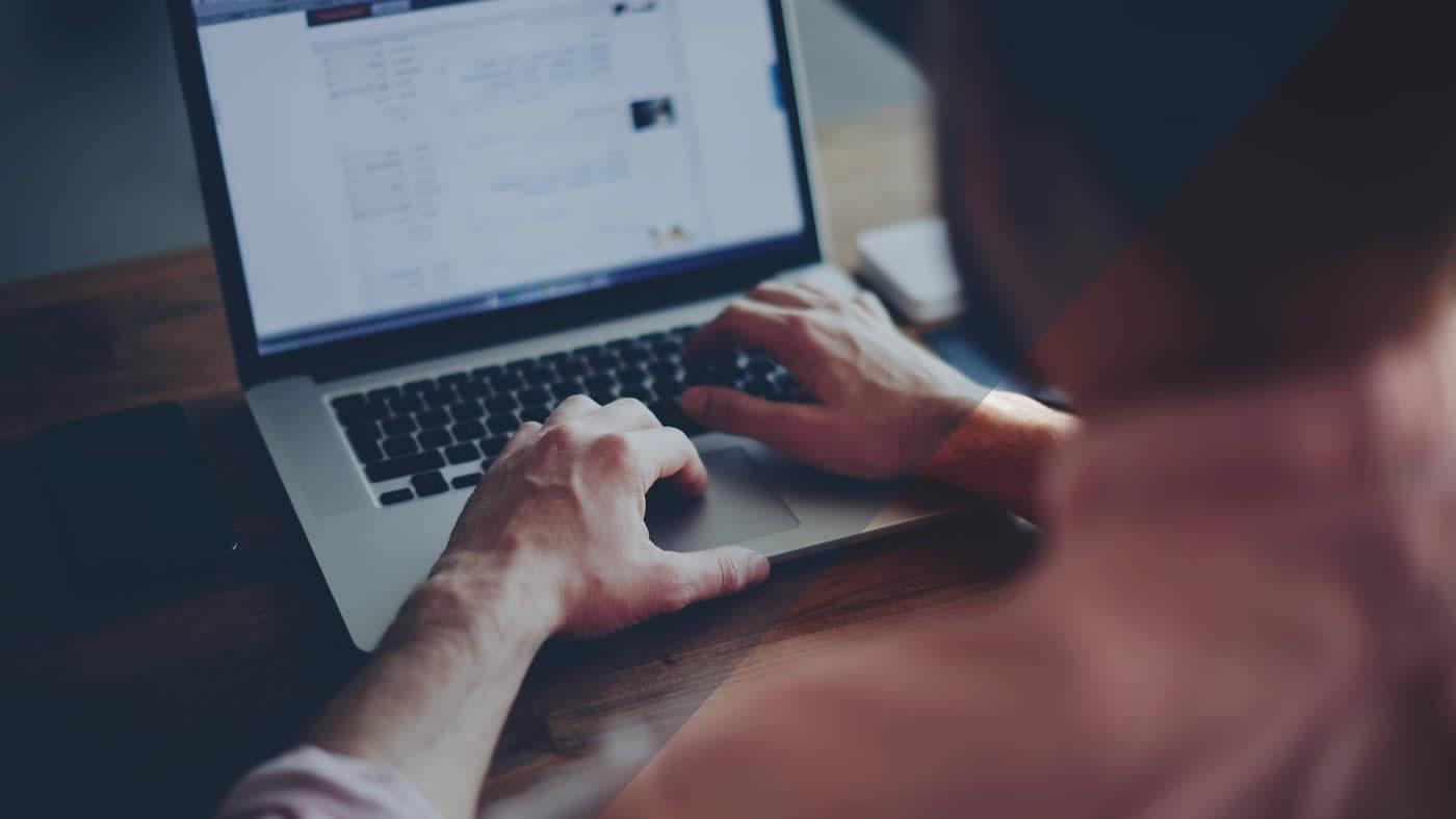 Working away on a laptop