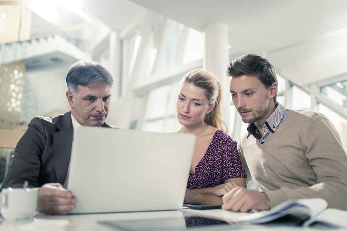 Chatting and looking at laptop
