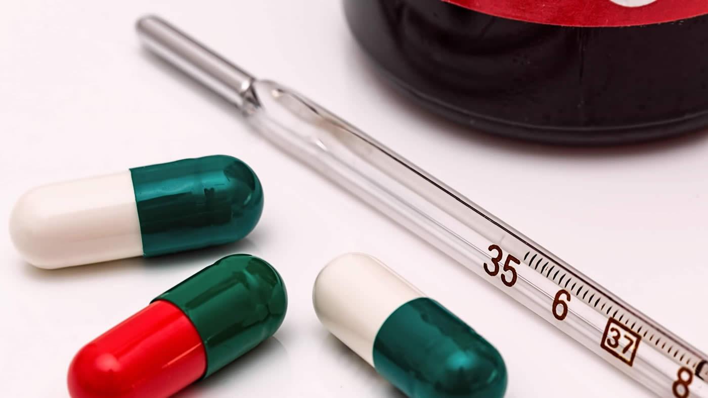Thermometer and pills