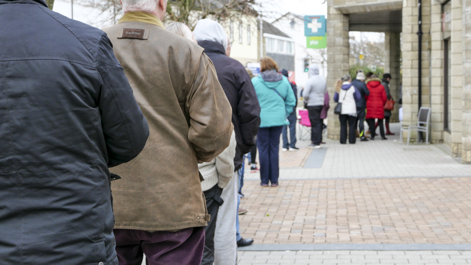 Queue of people trying to get their prescriptions, as people panic over Coronavirus